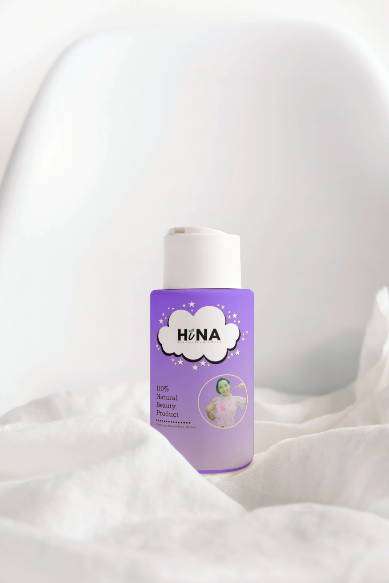 Hand holding black machined steel mechanical pencil with brass tip and top.